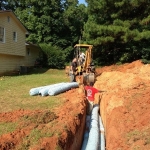 Installing Drainfield for Repair to System